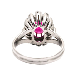 Bague Entourage en or blanc, rubis et diamants