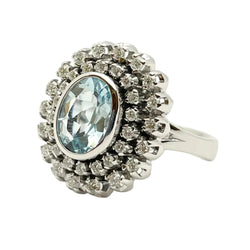 Bague Entourage en or blanc, aigue-marine et diamants
