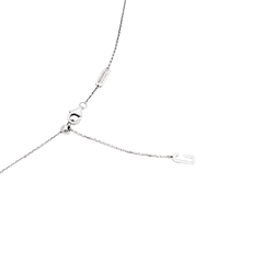 Collier Messika, "Move", or blanc et diamants.