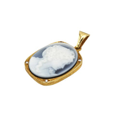 Pendentif en or jaune, onyx et diamants