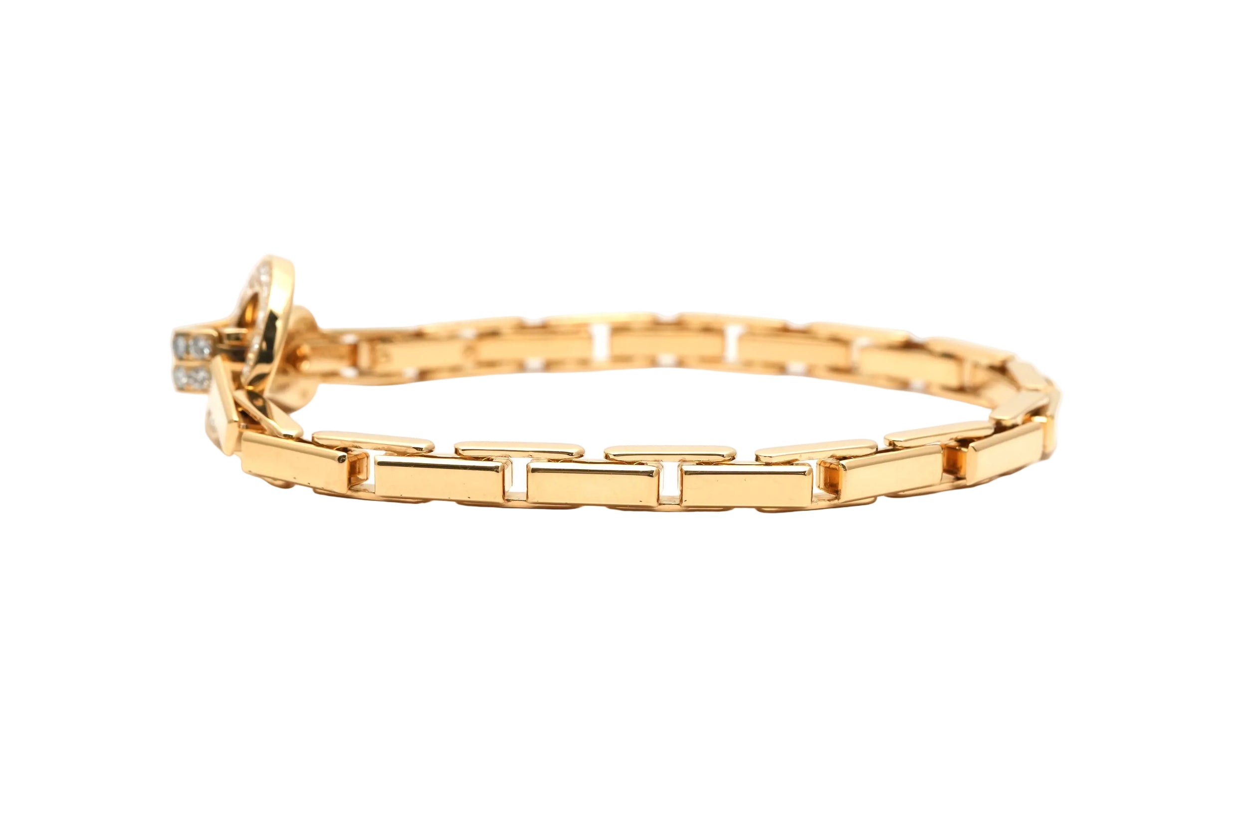 Bracelet Maille CARTIER "Agrafe" en or jaune et diamants