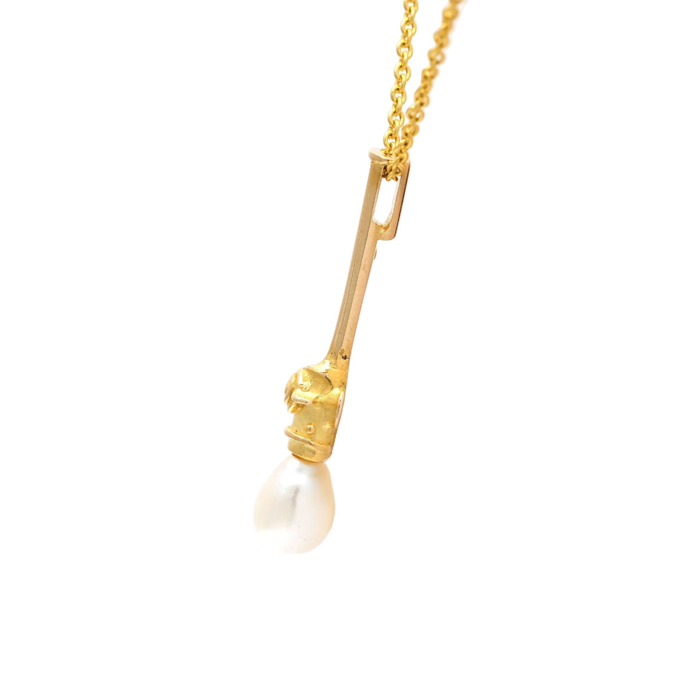 Pendentif en or jaune et perle