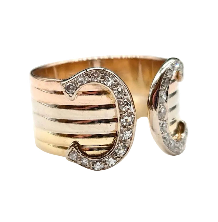 Bague Bandeau CARTIER "C de Cartier" en or blanc, or jaune, or rose et diamants