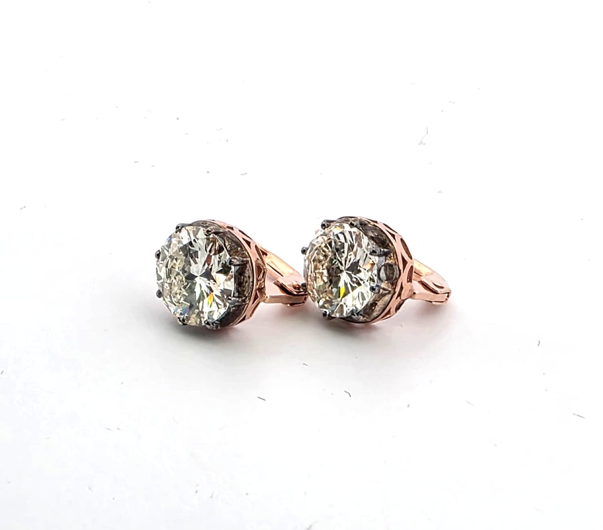 Boucles d'oreilles Dormeuses en or rose, argent et diamants