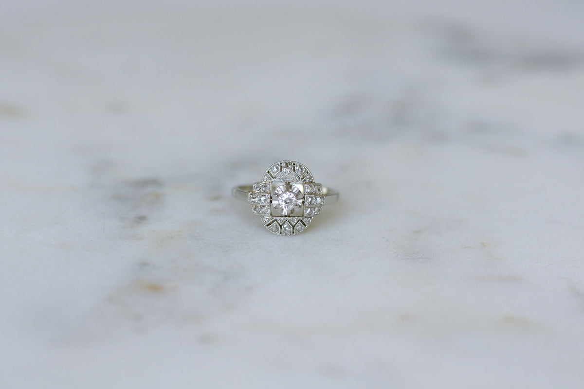 Bague Entourage en or blanc, platine et diamants