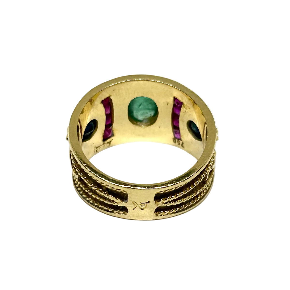 Bague Bandeau en or jaune, émeraude, rubis et saphirs