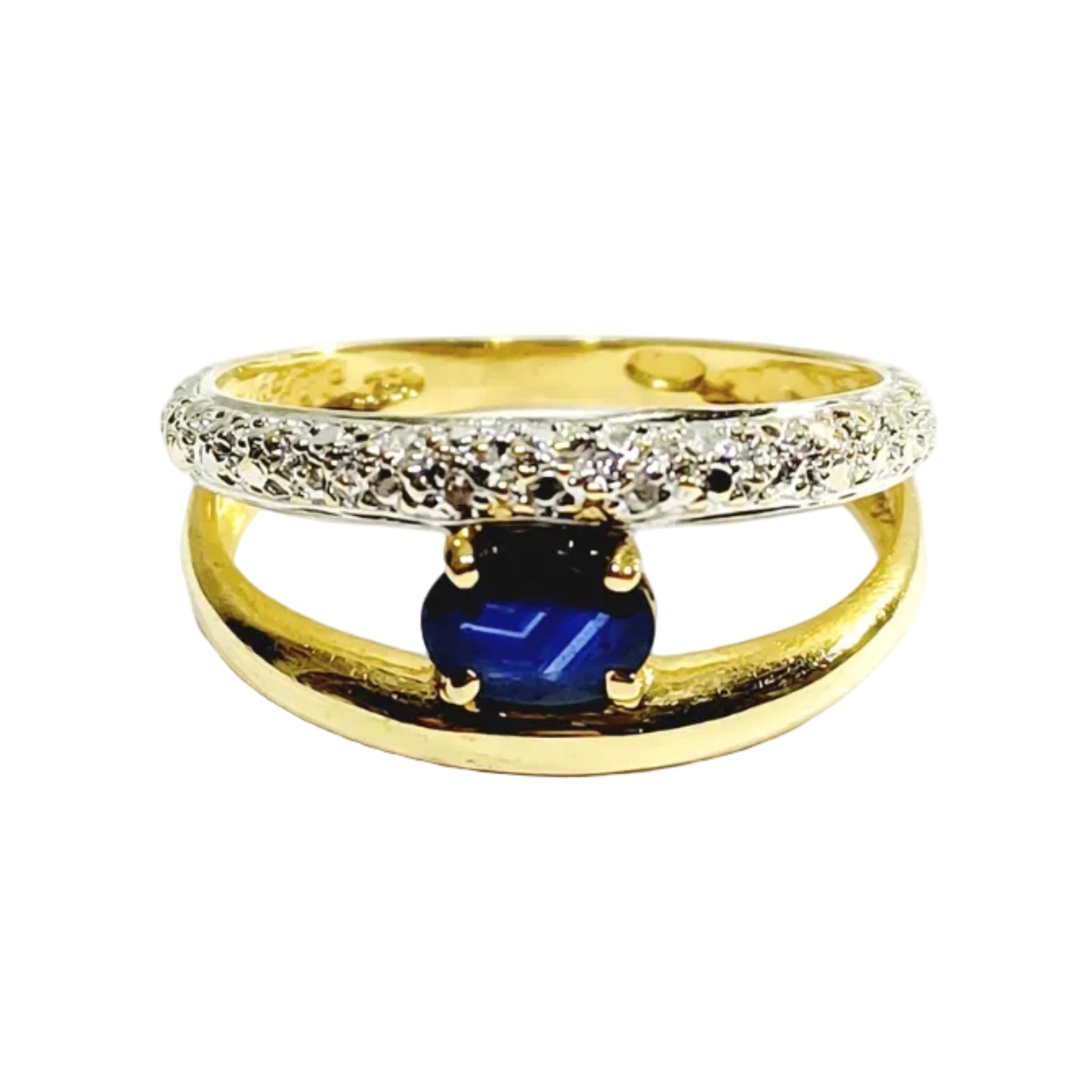 Ring in yellow gold, white gold, sapphire, and diamonds
