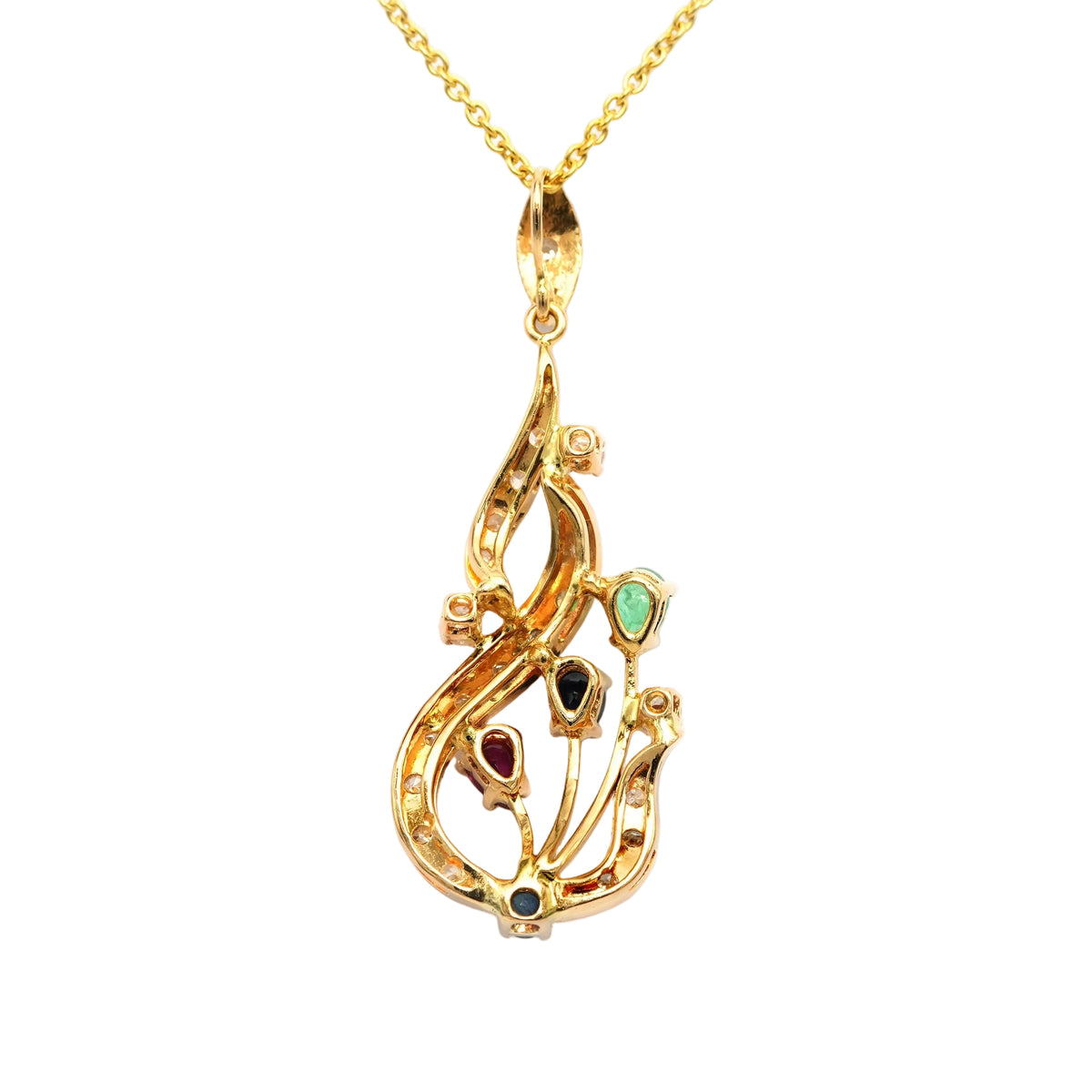 Pendentif en or jaune, rubis, saphirs, émeraudes et diamants