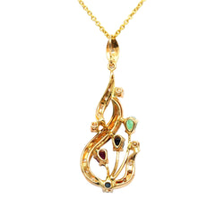 Pendentif en or jaune, rubis, saphirs, émeraudes et diamants