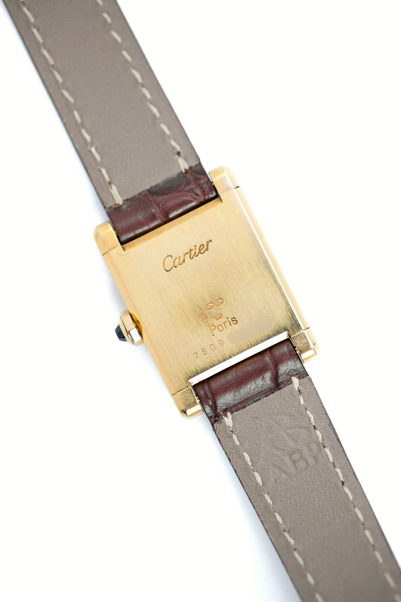 Montre CARTIER Tank en or jaune et cuir