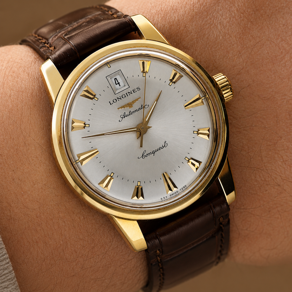Montre LONGINES "Conquest Heritage" en or jaune et cuir