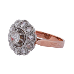 Bague Marguerite en or rose, platine et diamants