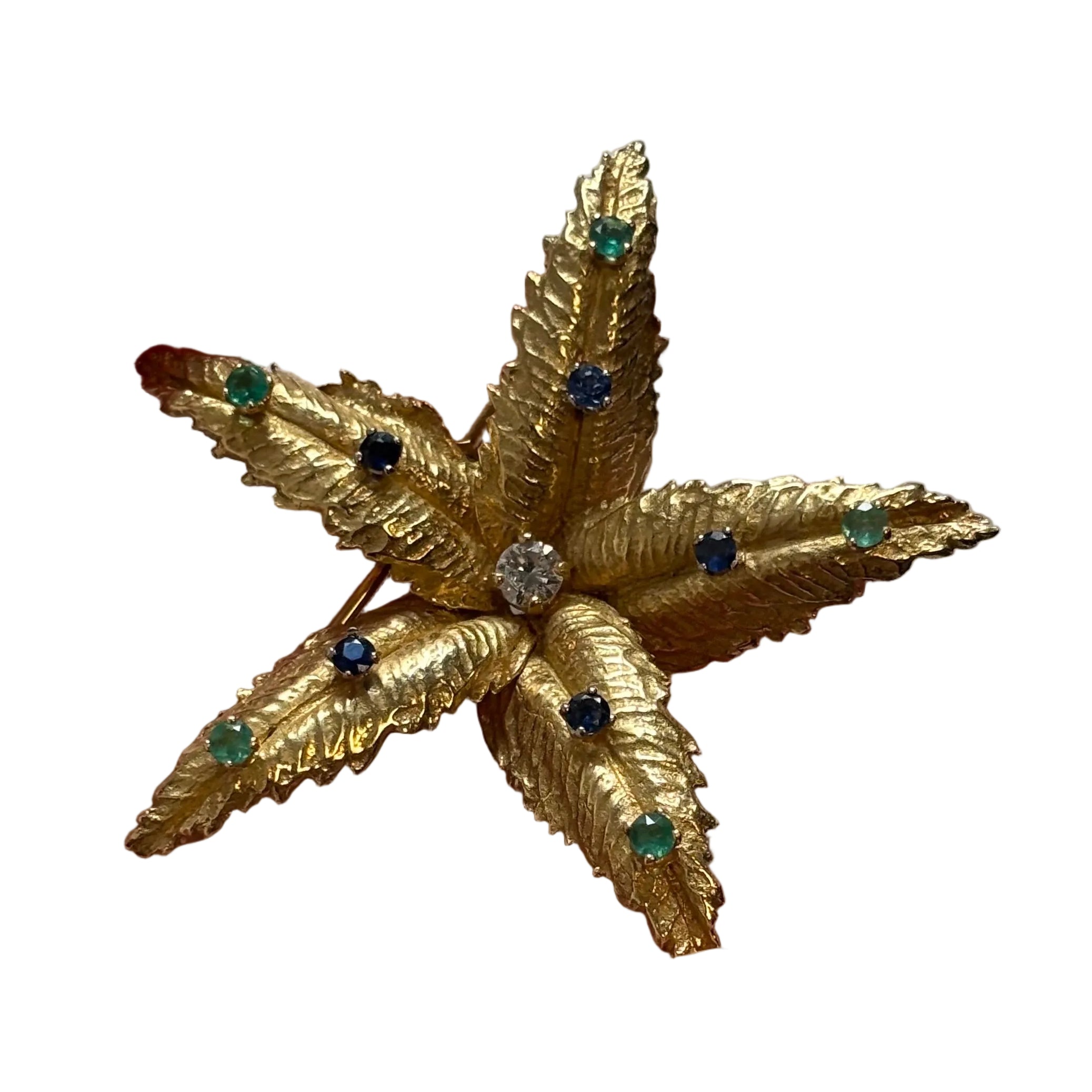 Broche BOUCHERON en or jaune, émeraudes, saphirs et diamant