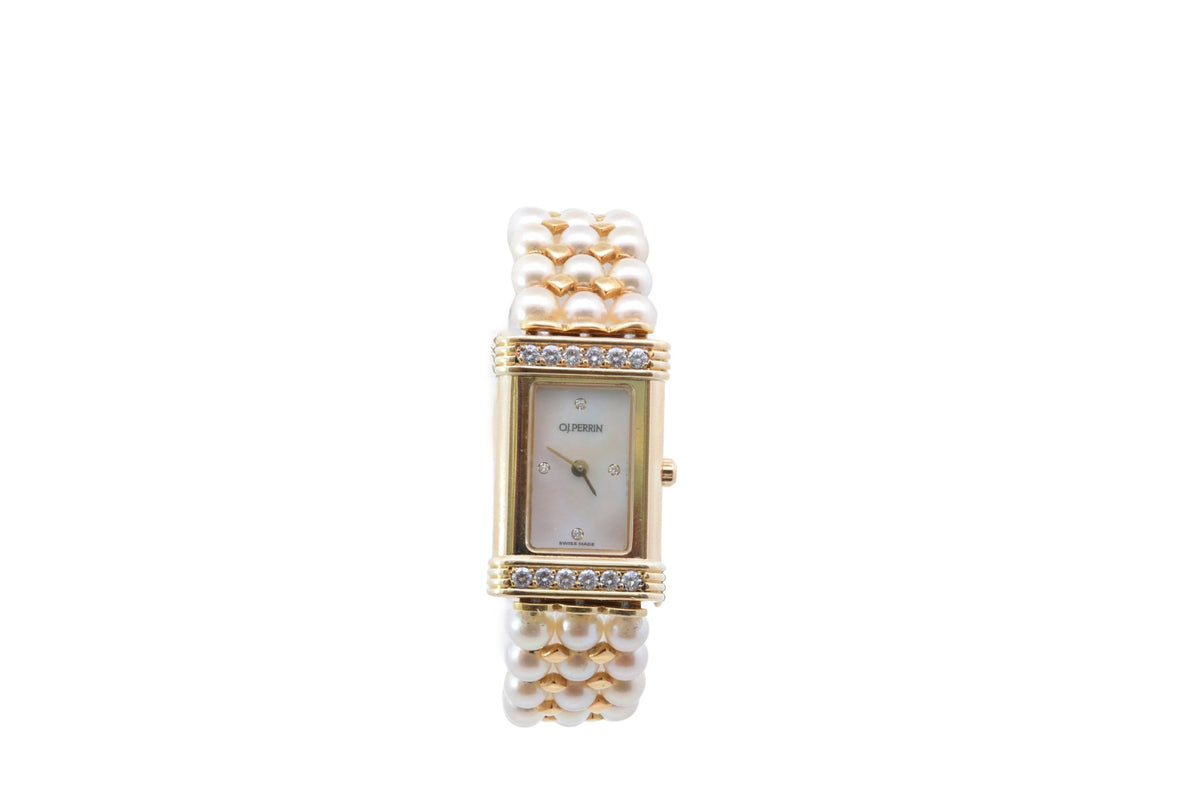 Montre OJ Perrin en or jaune, perles et diamants