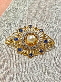 Broche en or, saphirs, perle et diamants