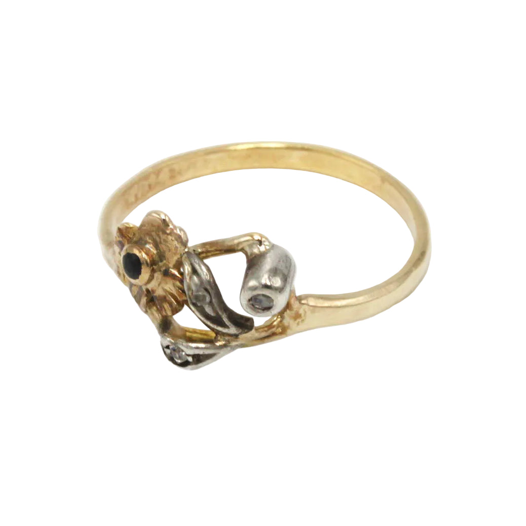 Bague en or jaune, argent, pierre noire et diamants