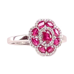 Bague Entourage en or blanc, rubis et diamants