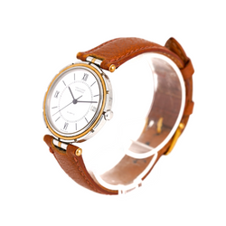 Montre VAN CLEEF & ARPELS "PA 49" GM en or jaune, acier et cuir