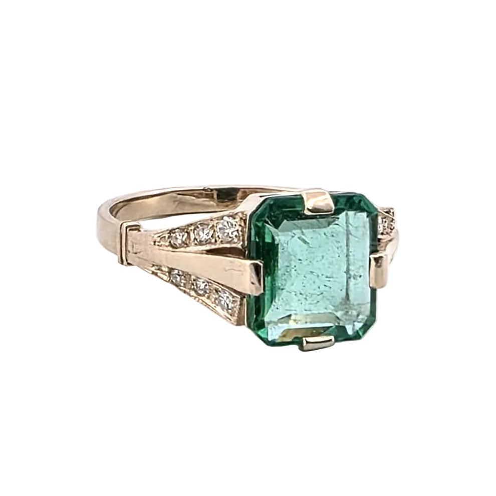 Bague Solitaire en or blanc, émeraude et diamants