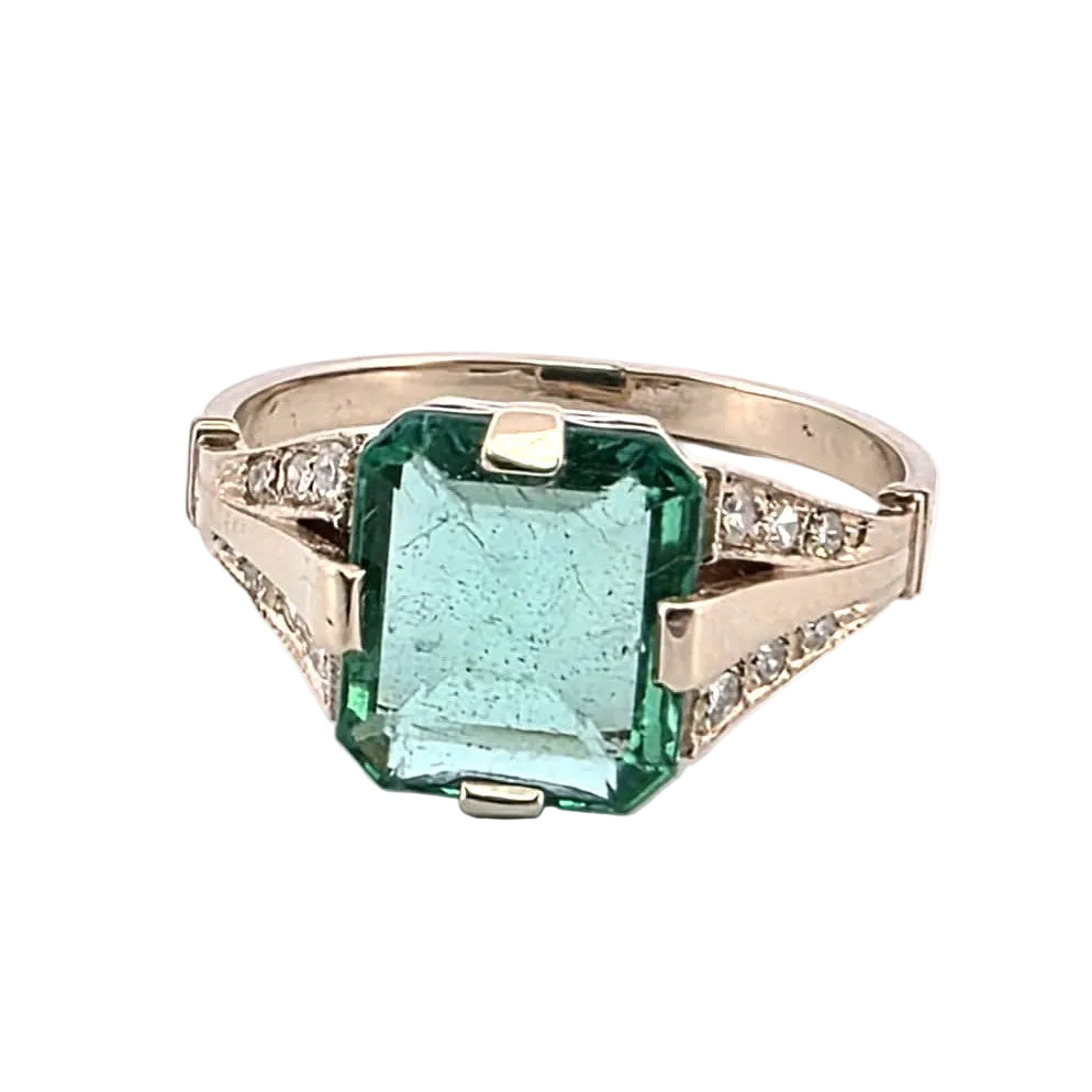Bague Solitaire en or blanc, émeraude et diamants