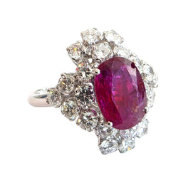 Bague Entourage en or blanc, rubis et diamants