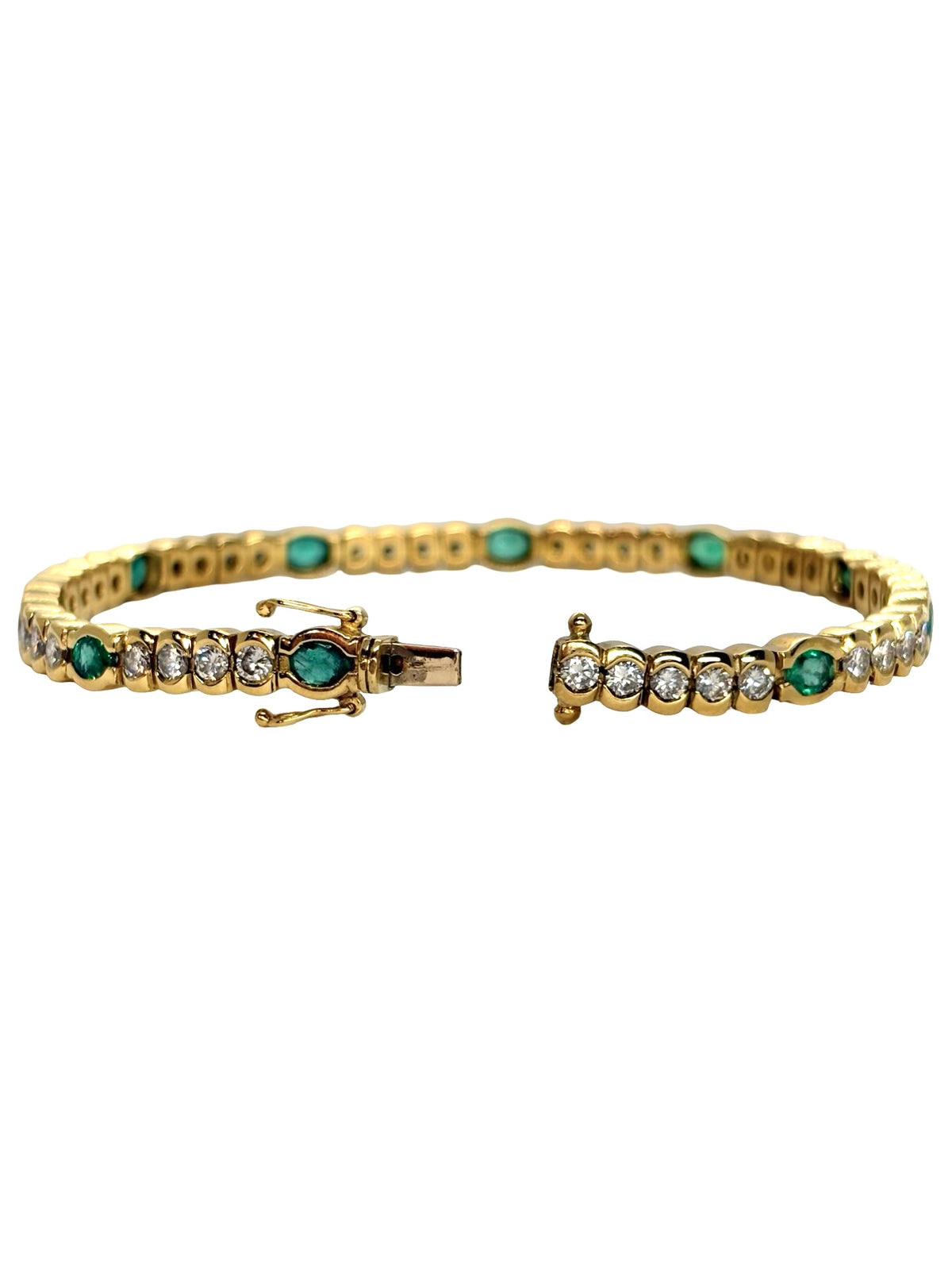 Bracelet Ligne en or jaune, émeraudes et diamants