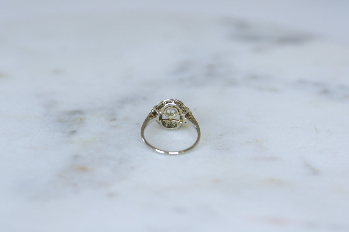 Bague Entourage en or blanc, platine et diamants