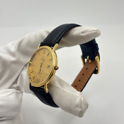 Montre OMEGA "Seamaster" en or jaune et cuir