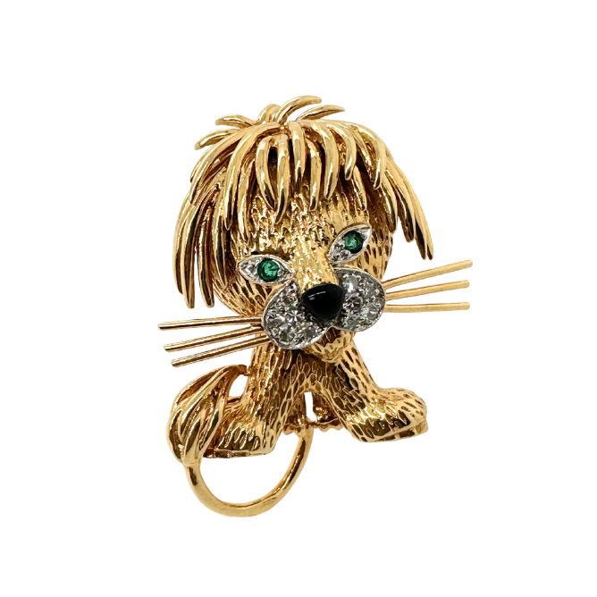 Broche VAN CLEEF & ARPELS "Lion ébouriffé" en or jaune, émeraudes, émail et diamants