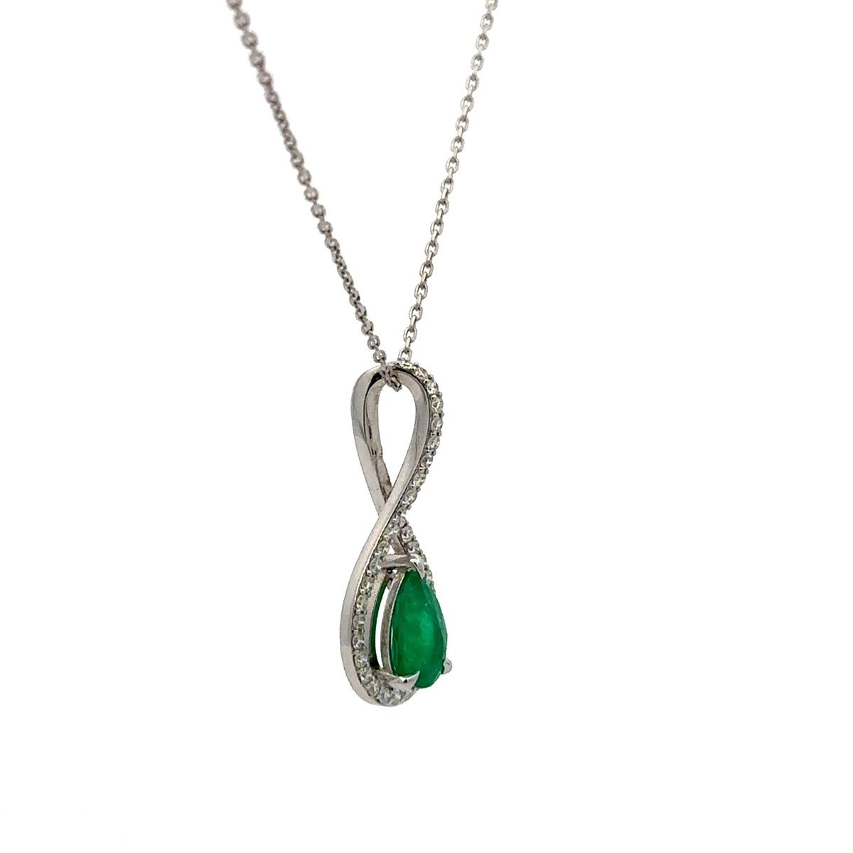 Pendentif en or blanc, émeraude et diamants