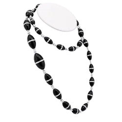 Collier R.CAMPELL en platine, onyx et diamants