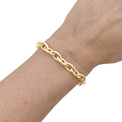 Bracelet Poiray, or jaune maillons navettes.