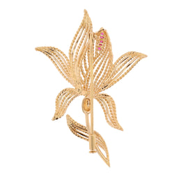 Broche Épingle en or jaune et rubis
