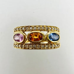 Bague Jonc en or jaune, saphirs et diamants