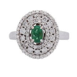 Bague Entourage en or blanc, émeraude et diamants