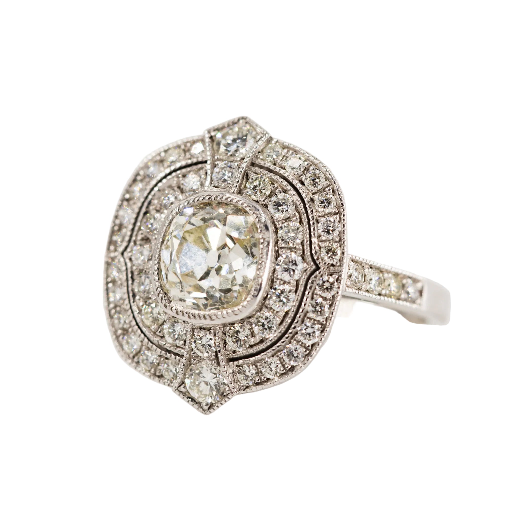 Bague Entourage en or blanc, platine et diamants