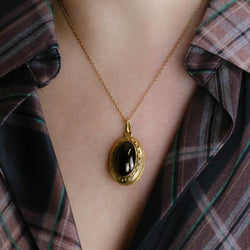 Pendentif en or jaune et grenat