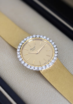 Montre CHOPARD, Réf. 810, or jaune 18 carats et diamants, bracelet intégré or massif, vers 1980.