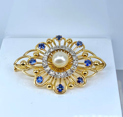 Broche en or, saphirs, perle et diamants