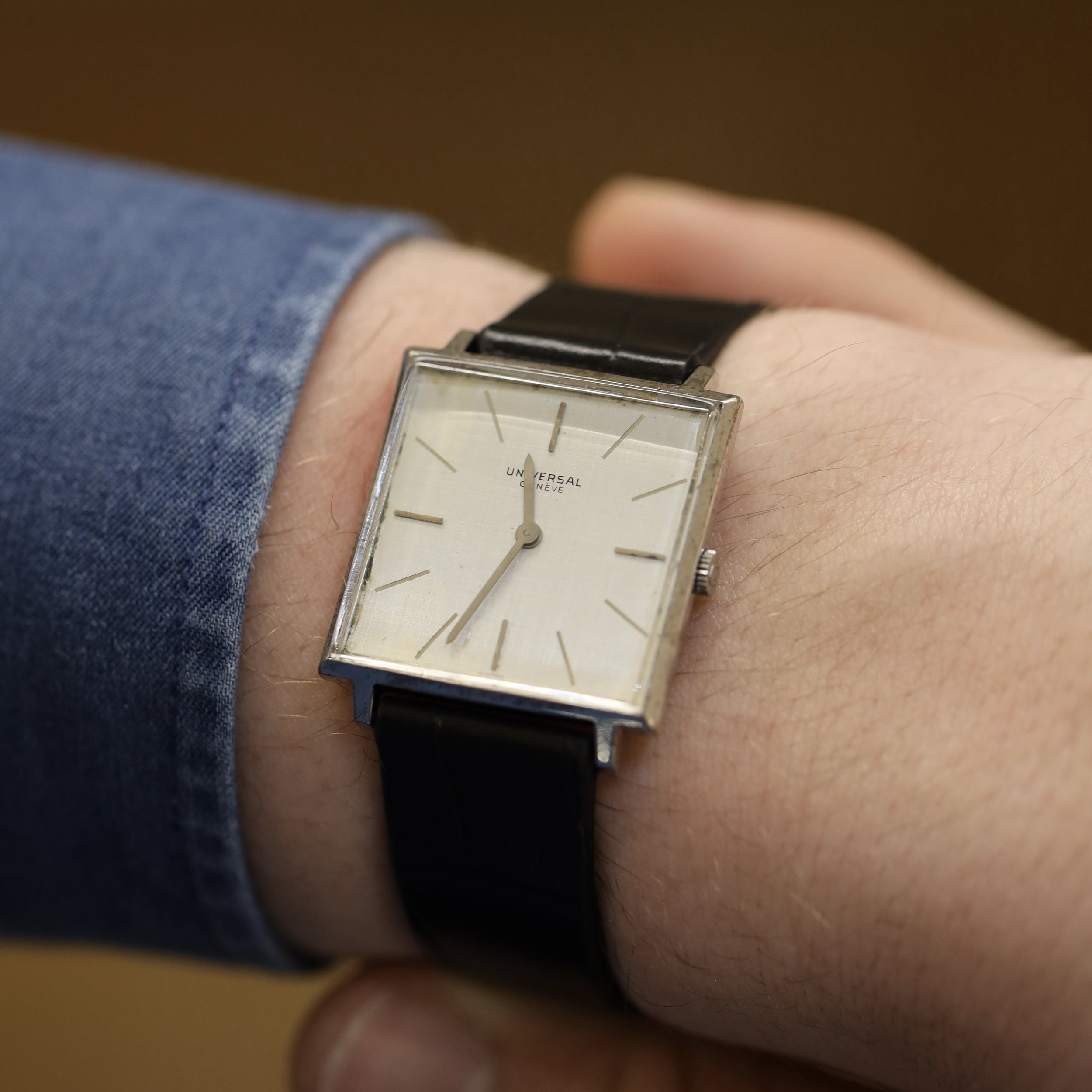 Montre UNIVERSAL en acier et cuir