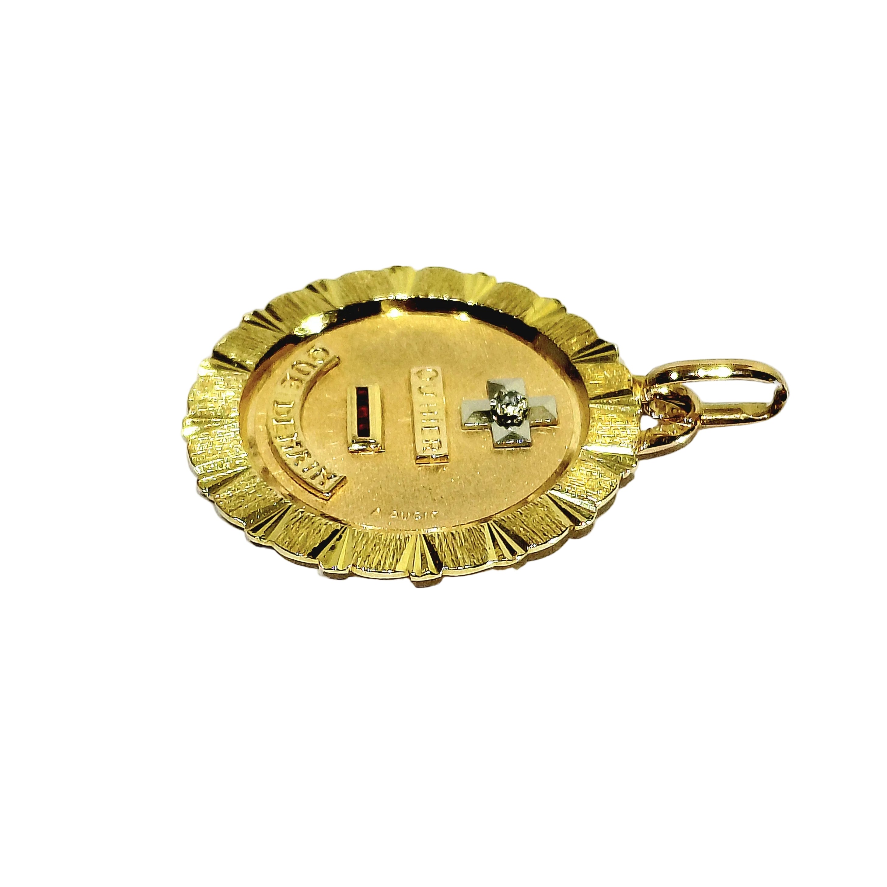 Médaille AUGIS en or jaune, or rose, rubis et diamant