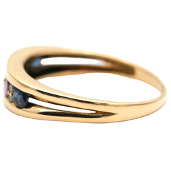 Bague en or jaune, émeraude, rubis, saphirs et diamants