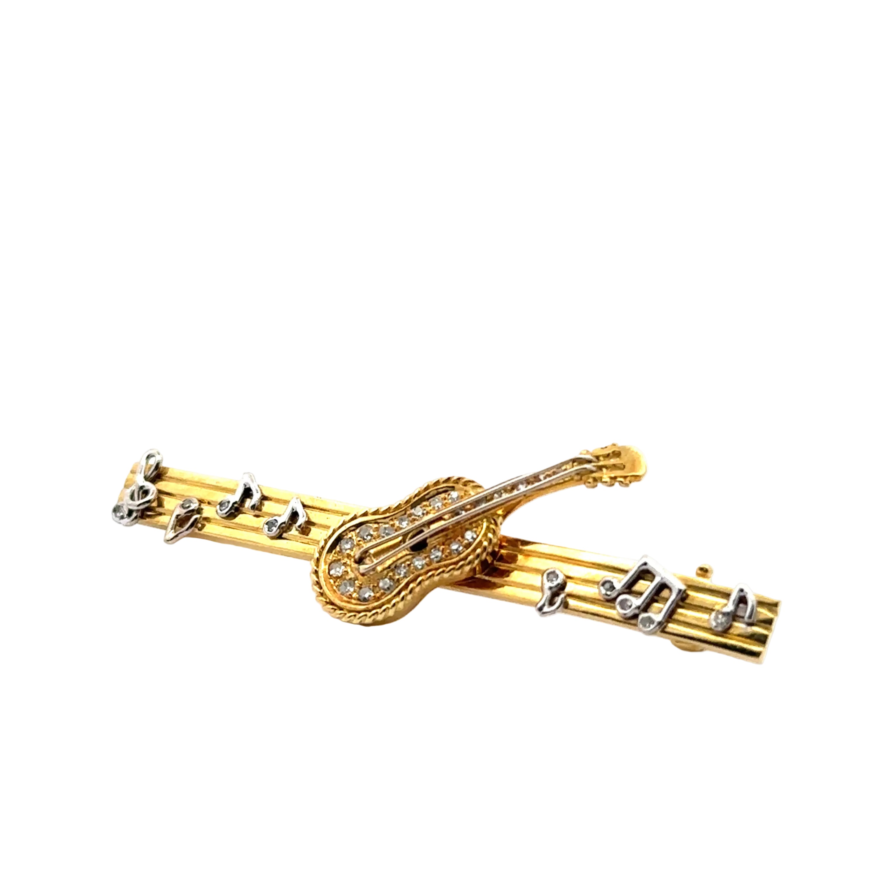 Broche en or jaune, or blanc et diamants
