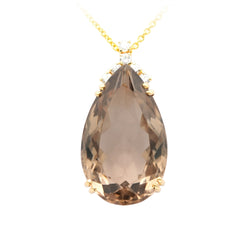 Pendentif en or jaune, quartz et diamants