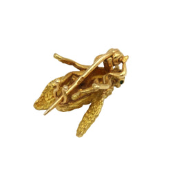 Broche Épingle en or jaune et émeraudes