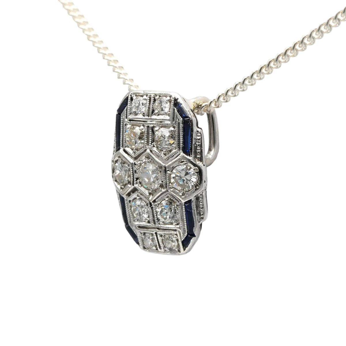 Pendentif en or blanc, saphirs et diamants