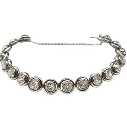 Bracelet en or blanc, argent et diamants