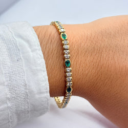 Bracelet Ligne en or jaune, émeraudes et diamants