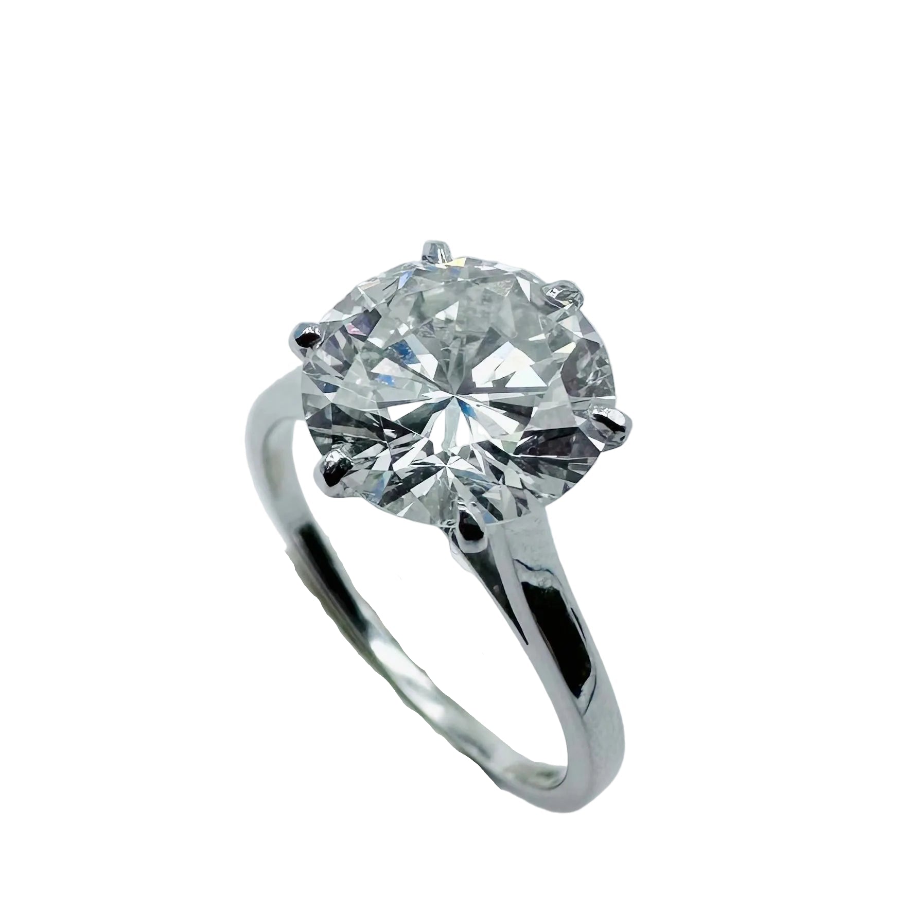 Bague Solitaire en or blanc, platine et diamant