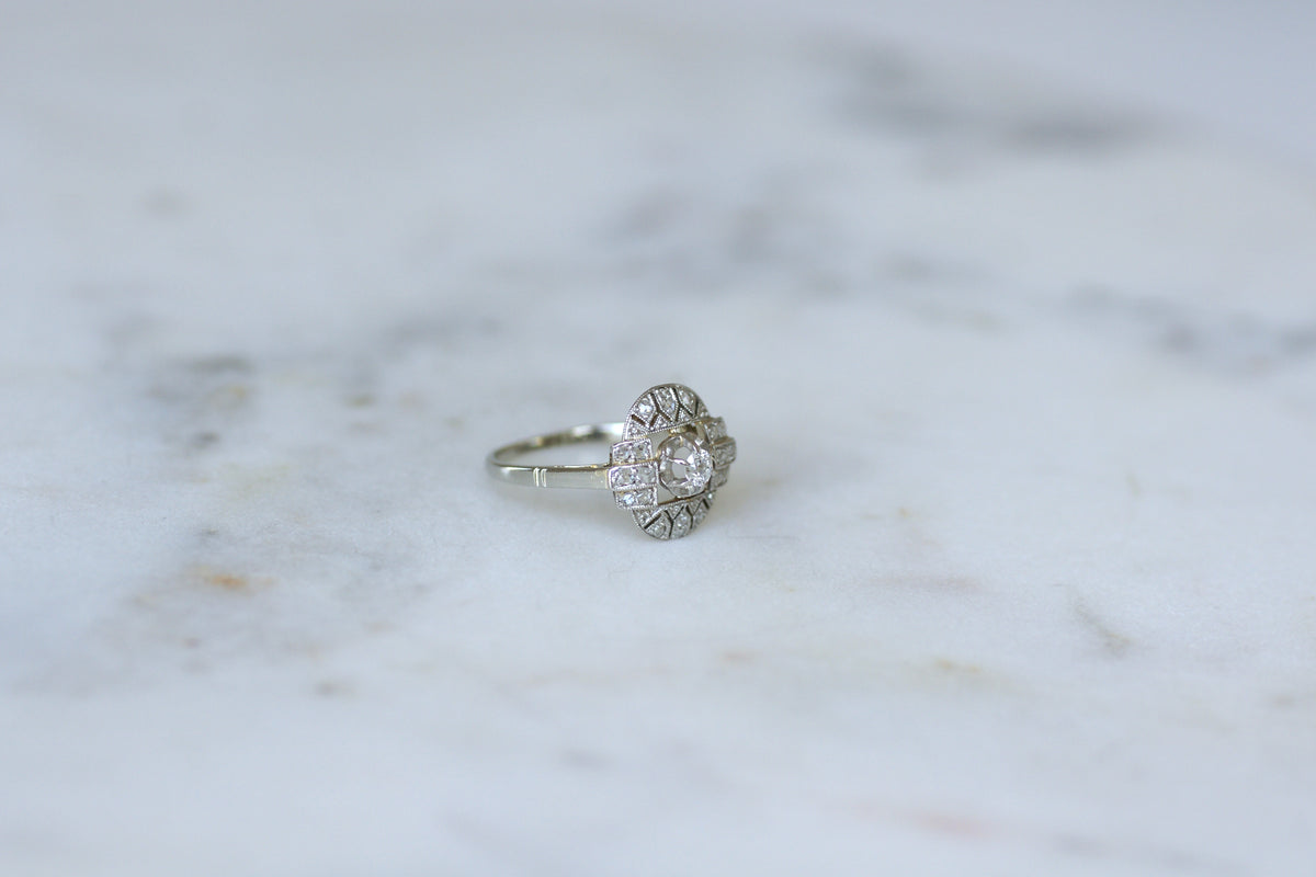 Bague Entourage en or blanc, platine et diamants